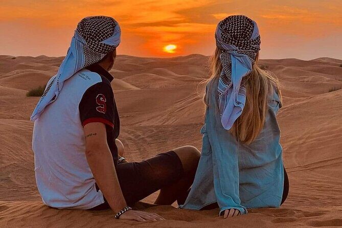 Desert Safari with BBQ Dinner, Camel Ride, Sand Board & Live Show - BBQ dinner, plus belly dance, fire show, and Tanoura