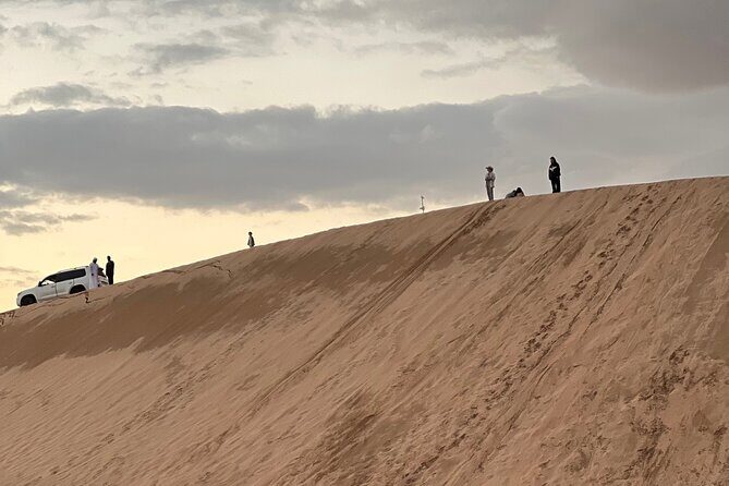 Desert Safari with Dune Bashing and Camel Ride plus Sand Boarding - Sand boarding: the skill level is lower than you think