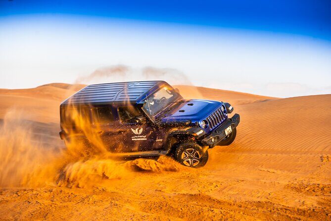 Dinner in the campsite with both way transfer - Al Lahbab Dune Driving and Sunset Photo Stops