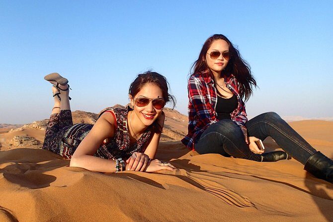 Dubai 4 Tours :Desert Safari,Dubai City Tour,Cruise Dinner & Abu Dhabi City Tour - Desert Safari in the conservation reserve: dune bashing, sand boarding, and Bedouin camp night