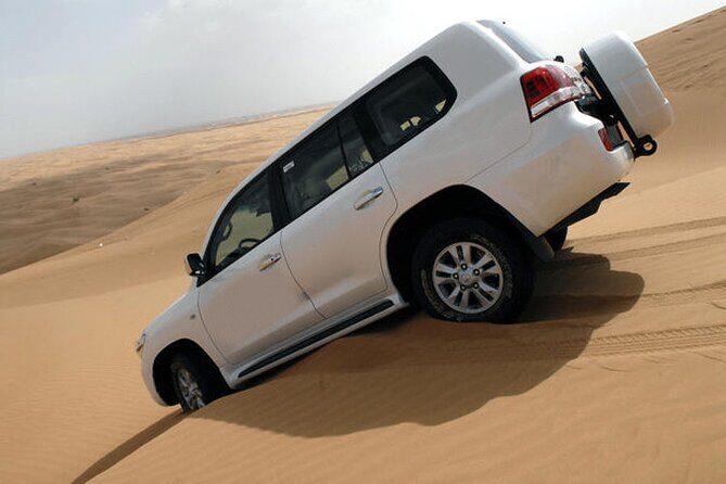 Dubai: 4X4 Desert Safari with BBQ Dinner - Sunset photo stop and sand boarding: the best timing moments