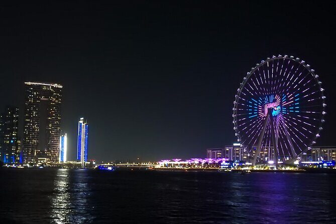 Dubai 5 Star Marina Dhow Cruise Dinner with Transfers - The Route at Night: Marina Views, Cayan Tower, and Ain Dubai Photo Timing