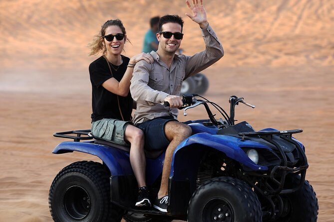 Dubai: Adventure Quad Bike Safari, Sandboarding, Camel Ride & BBQ - Sandboarding and the Sunset Photo Stop: Easy Thrills, Better Pictures