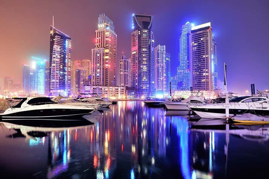 Dubai by Night City Tour with Fountain Show - Dubai Marina yachts and the skyline you came for