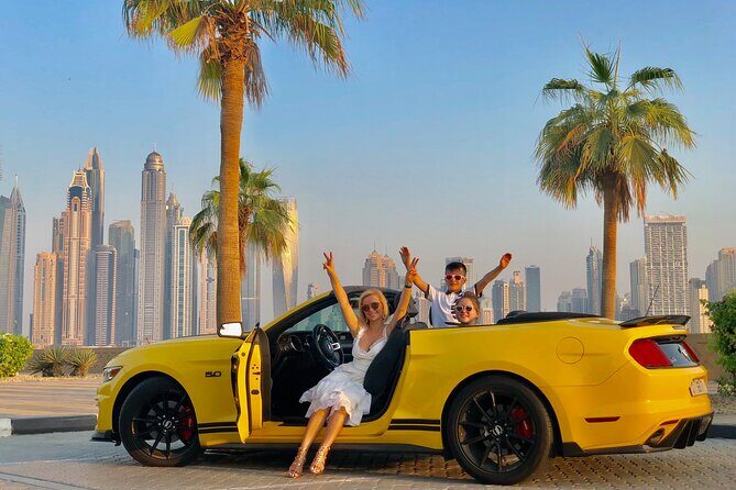 Dubai Cabrio Tour: Guided Tour of Top Sights in a Convertible Car - Dubai Marina: Yachts, Skyscrapers, and the Manhattan Comparison