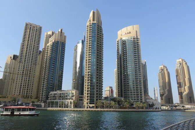 Dubai City Half Day Tour including Hotel Transfers - Burj Khalifa and Dubai Mall: the modern core from the road