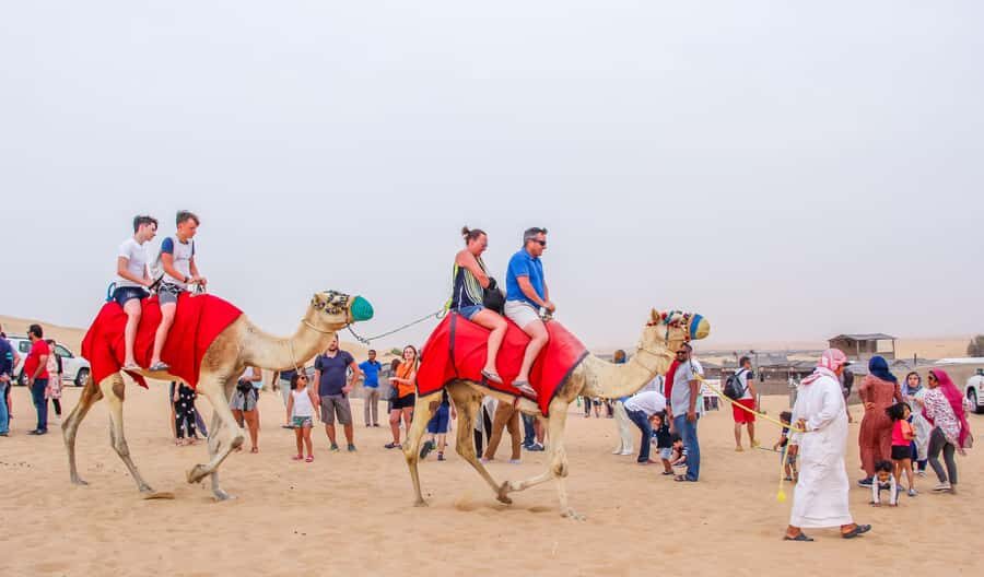 Dubai: City Tour and Desert Experience with Fun Activities - Logistics and Comfort: Pickup Cities, Group Size, and What to Wear