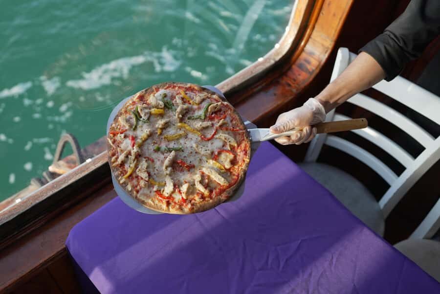 Dubai Creek Dhow Cruise with Unlimited Freshly Baked Pizza - Why a 1-hour Creek cruise with pizza can be the best kind of plan