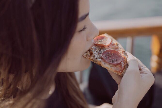 Dubai Creek Sightseeing Cruise with Unlimited Freshly Baked Pizza - Crew and audio commentary: what makes the vibe work