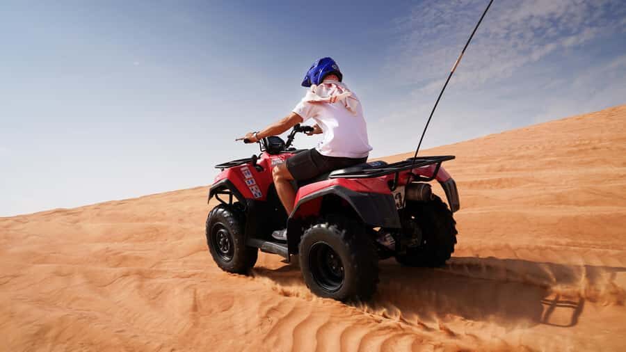 Dubai Desert Adventure: Red Dunes Guided Quad/Polaris & BBQ - Safety briefing first, then your quad bike or Polaris RZR setup