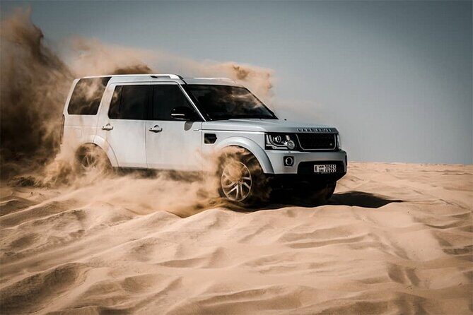 Dubai Desert Afternoon Safari with Camel Ride, BBQ Dinner, and Belly Dancing - Quad bikes and sand boarding: the action options