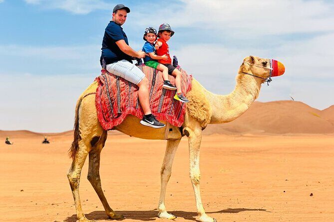 Dubai: Desert Camel Ride with Live Shows & BBQ Buffet Dinner - The Red Dunes Camel Ride: Sunset Views and Real Slow Travel