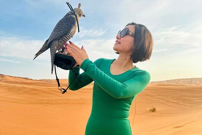 Dubai Desert Escape: Red Dunes Safari, Falcon, Camel & BBQ Dinner - Live Shows in the Desert: Belly Dance, Tanoura, and Fire Performance