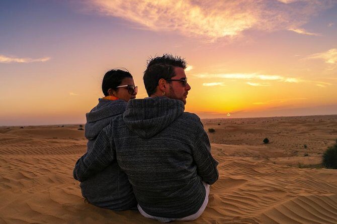 Dubai Desert Journey: Red Dunes Safari with BBQ in Bedouin Camp - Sandboarding, Photos, and the Sunset Moment
