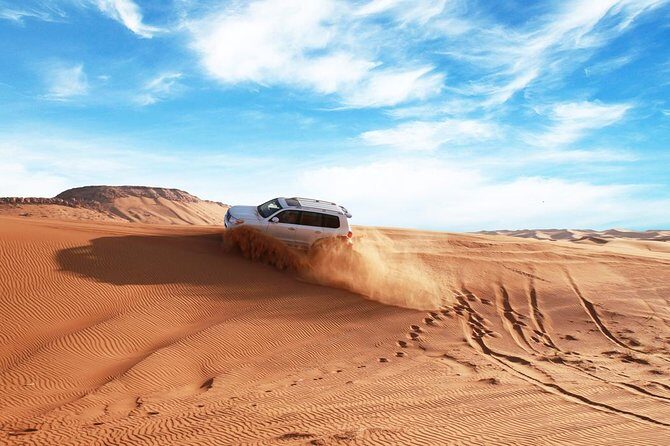 Dubai Desert Journey: Red Dunes Safari with BBQ in Bedouin Camp - Shared vs Private 4WD and the VIP Table Upgrade