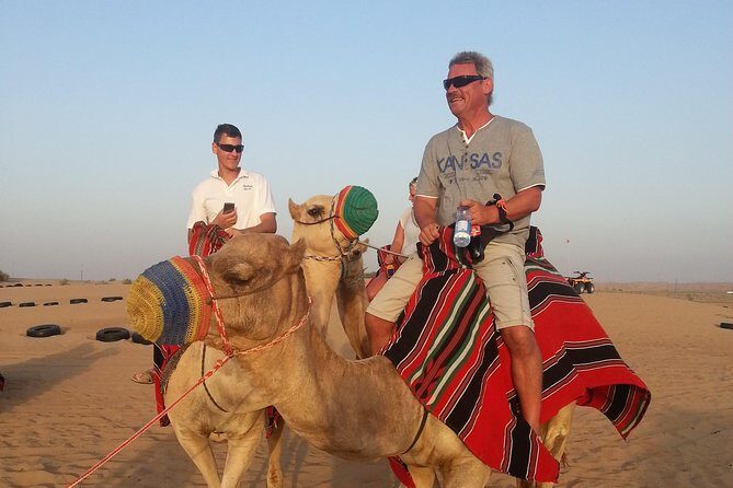 Dubai Desert Morning Tour in 4WD Vehicle: Camel Ride, Quad Bike Tour, Sandboarding, and Camel Farm - Morning Pickup in an Air-Conditioned 4WD