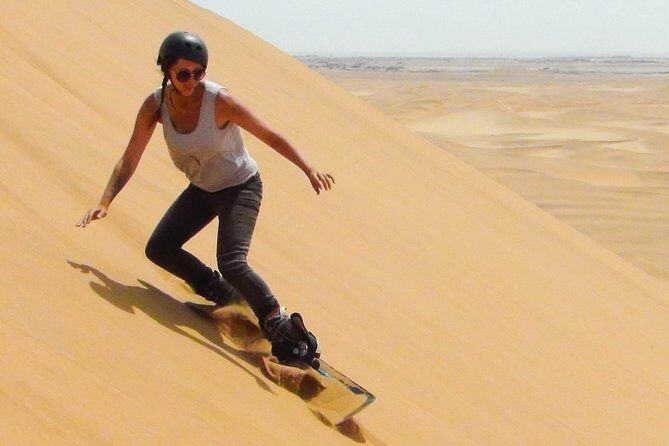 Dubai Desert Red Dune Half-Day Safari Adventure and BBQ Dinner - BBQ buffet dinner under stars: belly dance, Tanoura, and fire