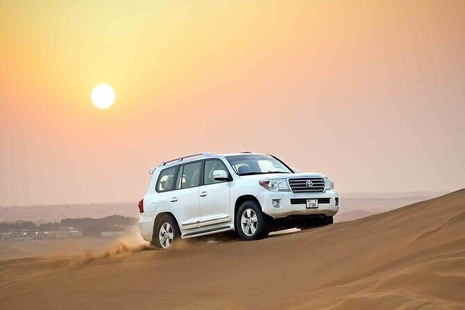 Dubai Desert Safari 20 mins Dune Bashing BBQ Live Show Camel Ride - From Your Hotel to Lahbab: How the Day Starts