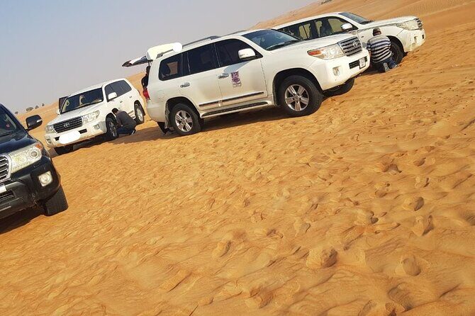 Dubai Desert Safari 4x4 Dune Bashing with Camel Riding - Camel Riding, Sandboarding, and Henna: More Than One Kind of Desert Fun