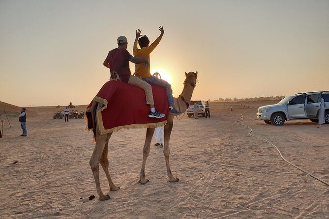 Dubai: Desert Safari 4x4 Dune with Camel Riding and Sandboarding - Traditional camp time: henna, Arabian sweets, coffee, dates