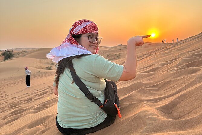 Dubai Desert Safari Adventure - Camp Arrival: Refreshments, Henna, Camel Riding, and Sunset Photos