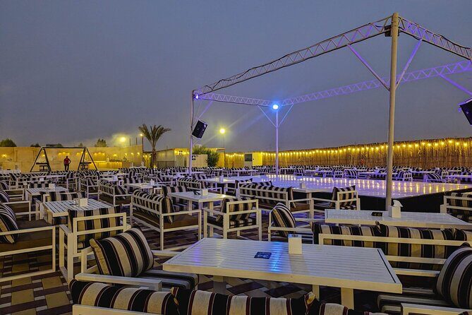 Dubai Desert Safari Adventure, Camel Ride, Sand surf, BBQ Dinner - Entertainment at the camp: belly dancing, fire show, and Tanoura