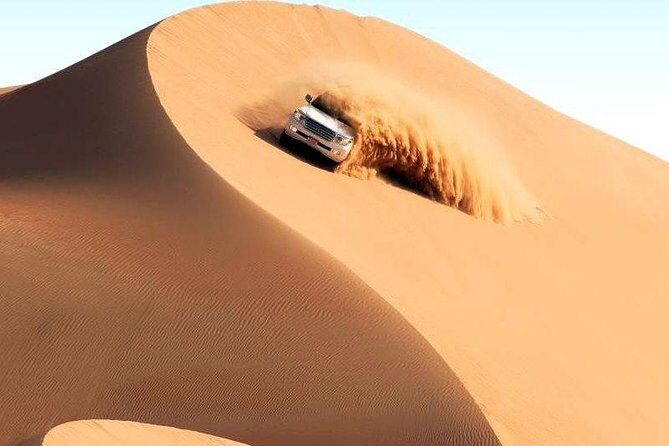 Dubai Desert Safari-BBQ Dinner, Belly Dance, Fire show - BBQ dinner under the stars: food, timing, and the show lineup