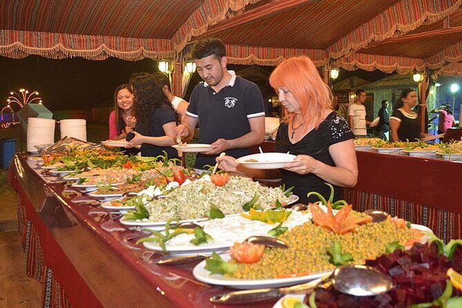 Dubai desert safari & buggy tour & flying dress for free - Camel Ride + Sandboarding: Two Ways to Feel the Desert