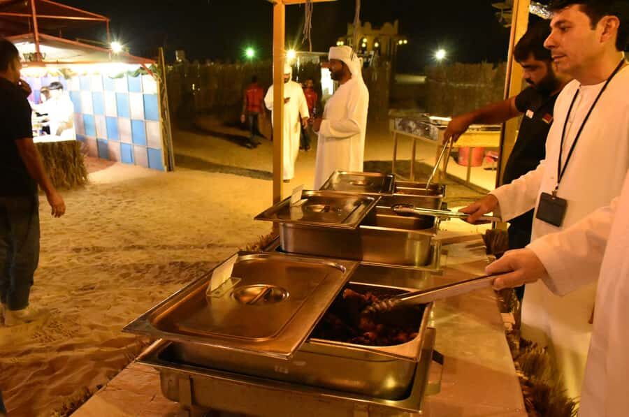 Dubai: Desert Safari, Camel Ride, and BBQ Dinner - Camel Farm Stop and the Camel Ride Across the Sand