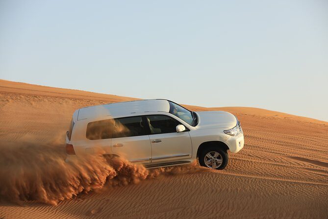 Dubai Desert Safari, Camel Ride, Refreshment & Quad Bike Option - Camel ride + camp time: the calm counterpart to the chaos