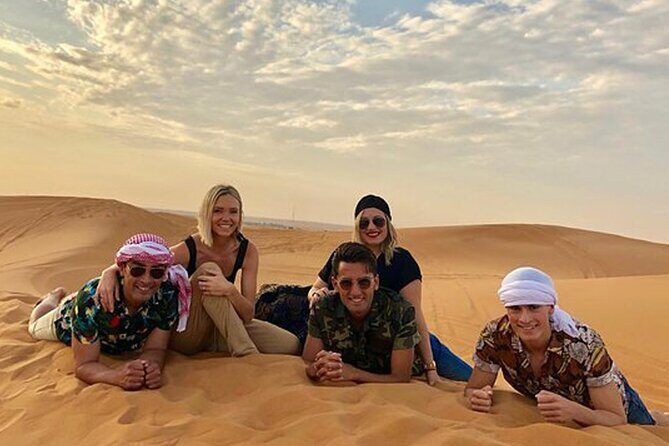 Dubai Desert Safari Experience with Dinner Dune Bash Sand Surfing - Sandboarding and camel photos: fun, but don’t expect too much time