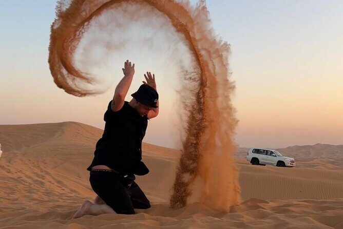 Dubai Desert Safari: Premium Adventure ,Camel Riding & Live Shows - Emirati Attire Photos and Sunset Photography: The Moments That Turn Into Keepsakes