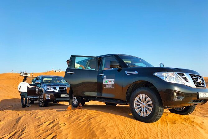 Dubai Desert Safari: Premium Adventure ,Camel Riding & Live Shows - Sandboarding at Camp: Trying the Sport Without the Headache