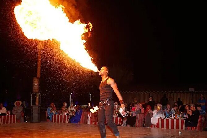 Dubai Desert Safari: Quad Bike, Camel Ride and BBQ Dinner - Live Entertainment Under the Stars: Belly Dance, Tanoura, Fire Show