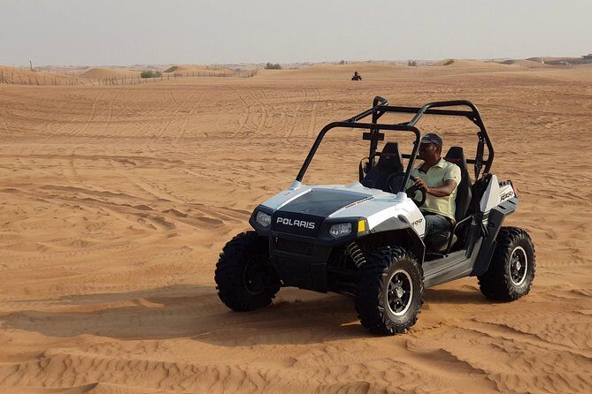 Dubai Desert Safari, Quad Bike, Camel Ride, and Buffet Dinner - Dune bashing and sandboarding at Lahbab: the best bang-for-your-time