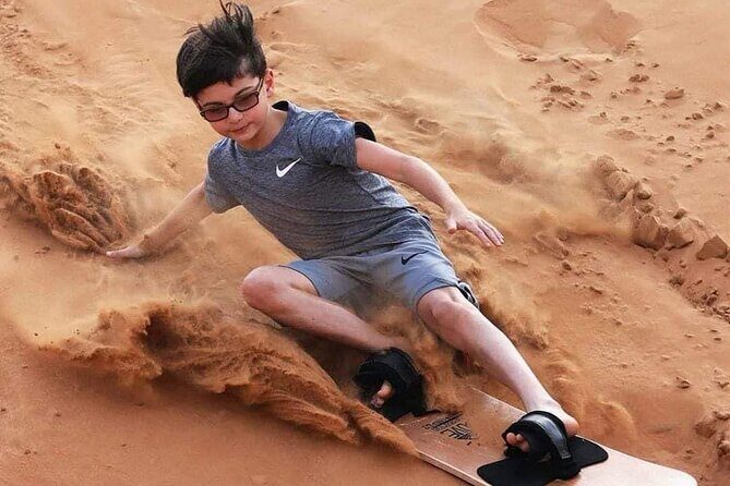 Dubai Desert Safari Sand board Camel Ride & Quad Bike - Pickup in an air-conditioned 4x4: your day starts without stress