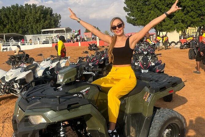 Dubai Desert Safari Sharing with Quad, Shows, Camel and Dinner - The 4x4 Dune Bashing and Sandboarding Part of the Night