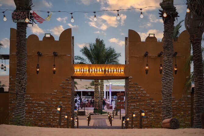 Dubai Desert Safari Standard Package - Camp atmosphere at Unique Desert Tourism: food flow, drinks, and the hookah corner