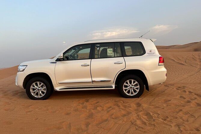 Dubai Desert Safari Thrilling Adventure Unforgettable Experiences - Belly Dance, Fire Show, and Tanura at Night