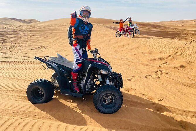 Dubai Desert Safari Tour with Quad Bike for 60mins & BBQ Dinner. - 60 minutes on the quad bike: your self-drive adrenaline segment