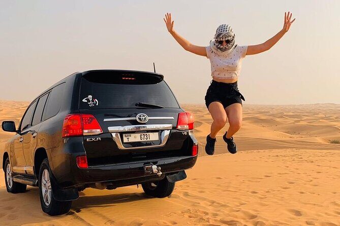 Dubai desert safari with 4x4 Dune Bashing,Camel Ride sand board - Dubai Camel Racing Club stop: a short look at stunning racing camels