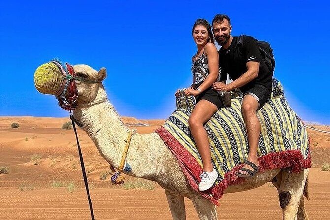 Dubai Desert Safari with Adventure Quad Bike and Buggy Ride - Sandboarding and camel ride: how the package balances thrill with tradition