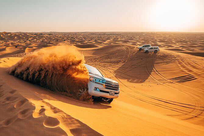 Dubai Desert Safari with ATV(optional)& Sandboarding Experience with BBQ Dinner - Entering the Dubai desert at 3:30 pm