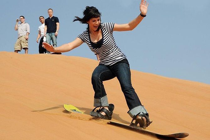 Dubai Desert Safari with BBQ Dinner, Camel Ride, and Shows - 4x4 dune bashing: the adrenaline you’ll remember