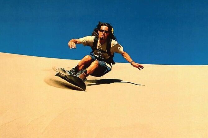 Dubai Desert Safari with BBQBuffet, Dune Bashing, Boarding, Camel - Henna, Arabic Dress Photos, and the Camp Welcome