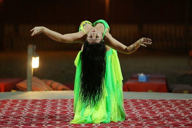 Dubai Desert Safari with Belly Dance, Fire Show and Tanura Show-The Full Package - Camp arrival: Arabic coffee, dates, and the in-between moments