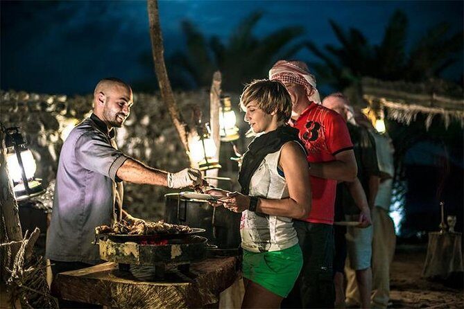 Dubai: Desert Safari with Camel Ride & Dune Bashing - Bedouin Camp Evening: Falconry, Henna, and Desert Bread