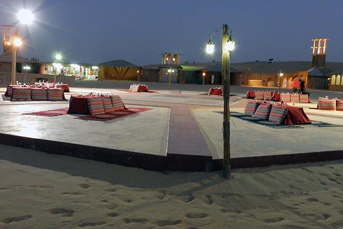 Dubai Desert Safari with Camel Ride, Show, BBQ and Transfers - Entering the desert with a camp built for the full evening