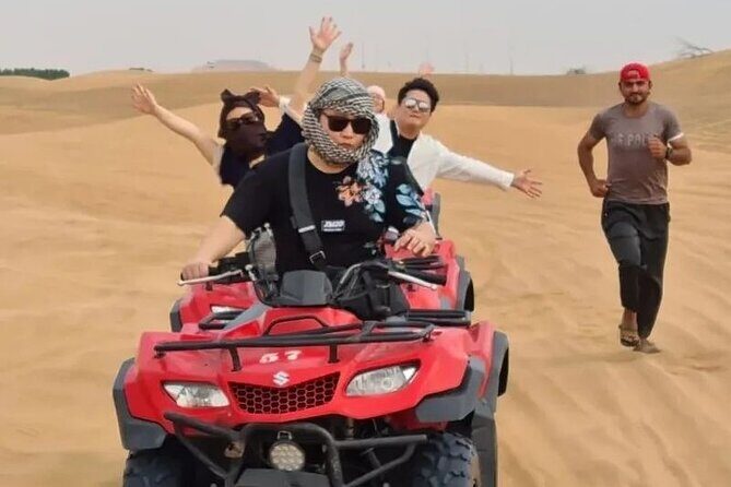 Dubai Desert Safari With Dinner And Live Shows - Camel Ride, Henna, and Falcon Photo Moments