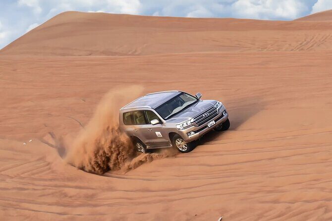 Dubai Desert Safari with Dune Bashing & Live Shows - The Al Awir Bedouin-style camp: camel ride, henna, and real atmosphere